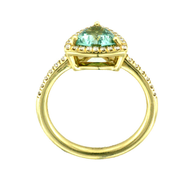 18 karat yellow gold ring holds a 1.33 carat trill fine green tourmaline with 0.31 carats of diamonds. 